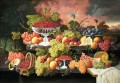 Nature Morte avec des fruits et un paysage au coucher de soleil