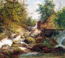 Moulin près d'un cours d'eau de montagne