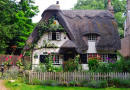 Cottage avec toit en chaume à Houghton, Angleterre