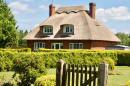 Maison Anglaise traditionnelle avec toit en chaume