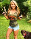 A Girl with guns & her dog