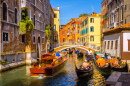 Narrow Canal with Gondolas in Venice
