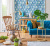 Blue Classic Sofa Furniture Home Design and Wood Rocking Chair, Gold Lamp and Middle Table, Palette Bookshelf, Vase of Green Pla