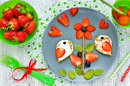 Creative Idea For Kids Breakfast - Funny Pancakes Shaped Spring Birds On the Flower With Strawberry Kiwi Blueberry