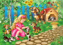 Petite fille jouant avec des chiots