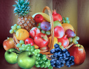 Composition avec des fruits dans un panier en osier